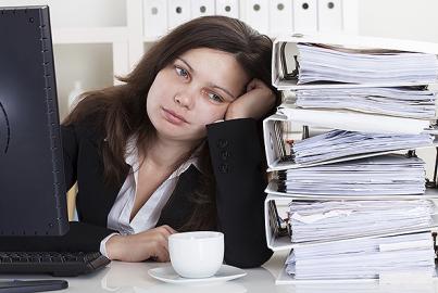 Stressed woman working in office